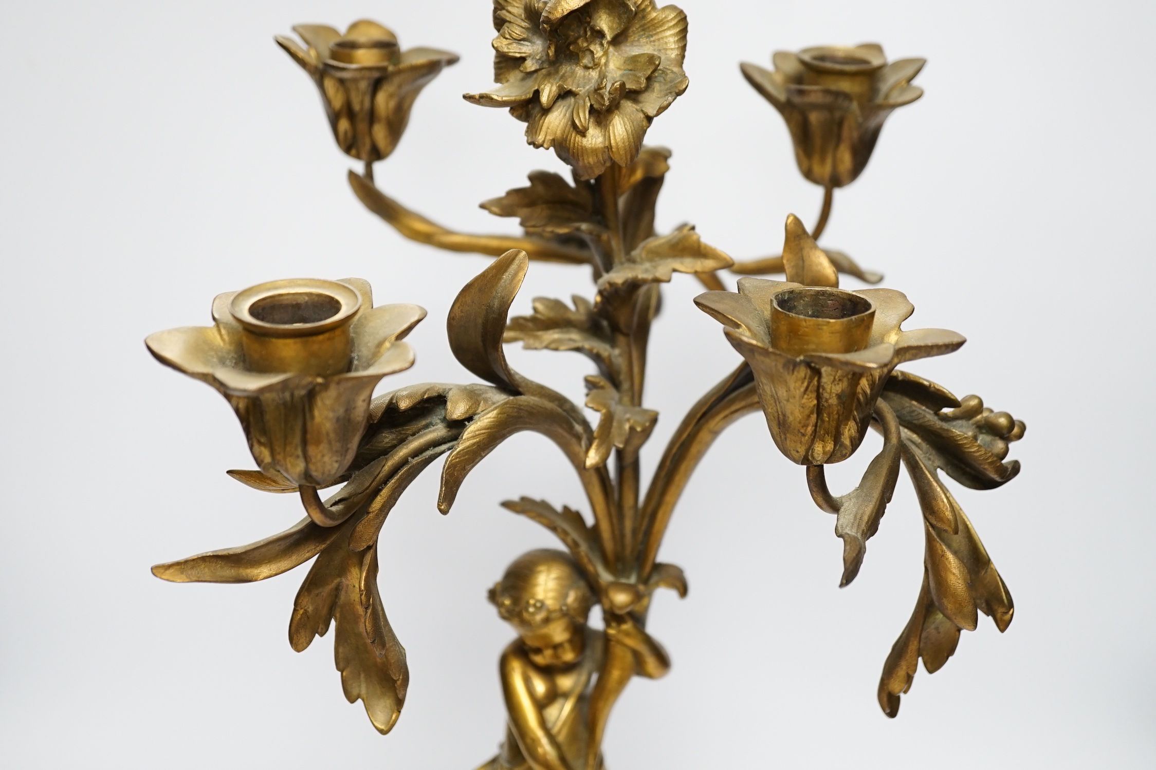 A 19th century ormolu and slate cherubic candelabrum, 58cm